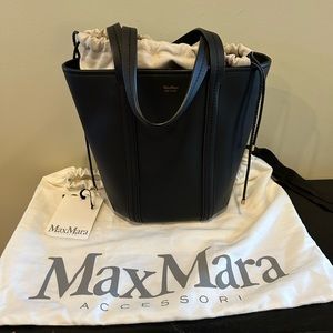 Max Mara bucket tote in black with cream insert.